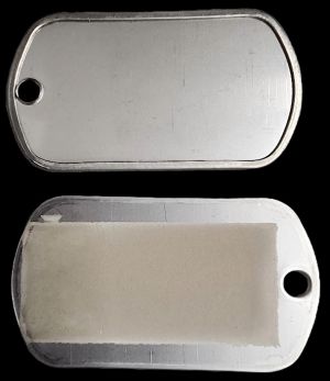 G.I. DOG TAG WITH CERMARK BAND ON FLAT SIDE. 1 1/2" x 3/4